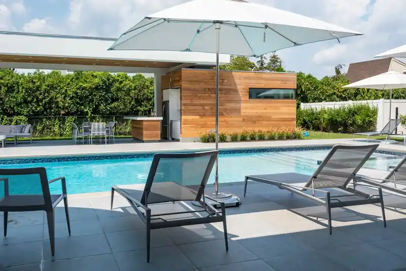 Pool beside a covered pavilion